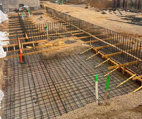 wood and metal forms setup for creating a concrete foundation